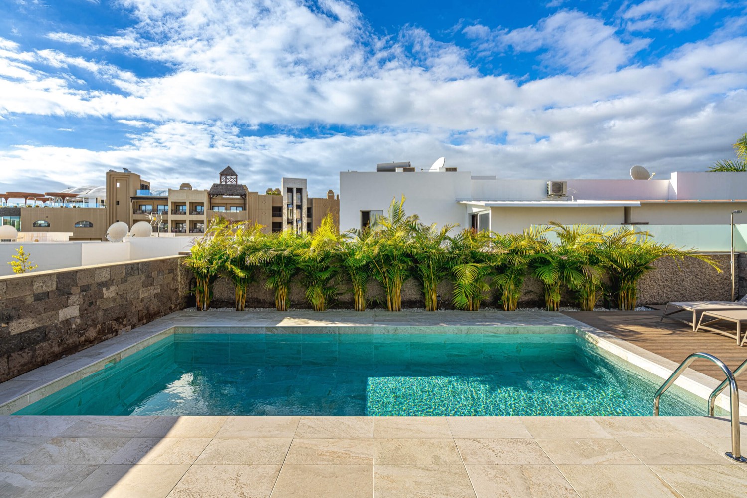 Heated pool and sun terrace at Villa 32