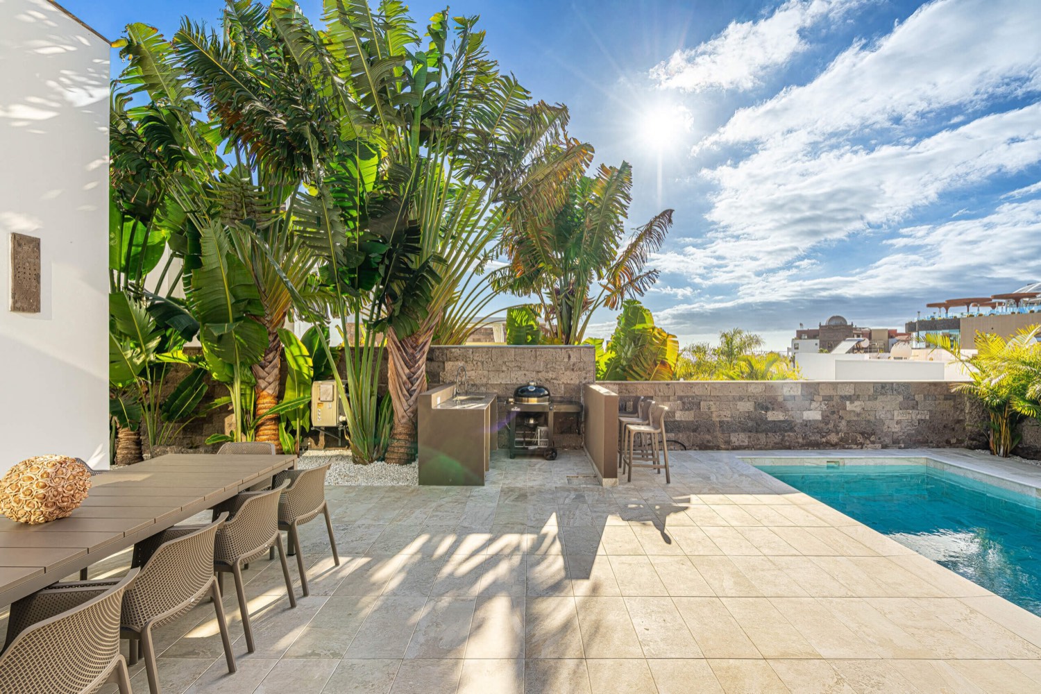 Outdoor dining and living area at Villa 32