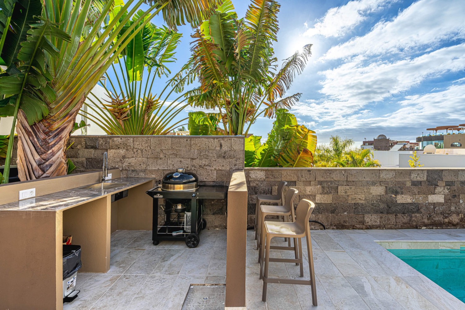 Outdoor kitchen and barbecue at Villa 32