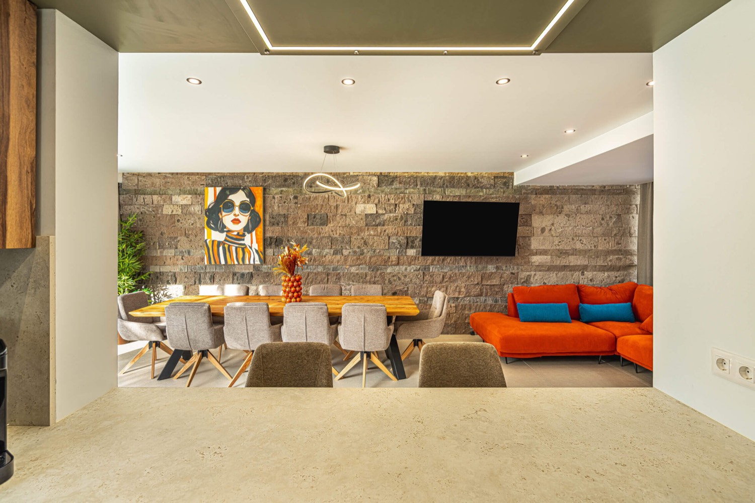 Open-plan living room and kitchen at Villa 32